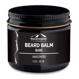A black jar of Mountaineer Brand Products Natural Beard Balm labeled "bare unscented," infused with natural essential oils, housed in a clear glass container with a white lid, containing 2 oz.