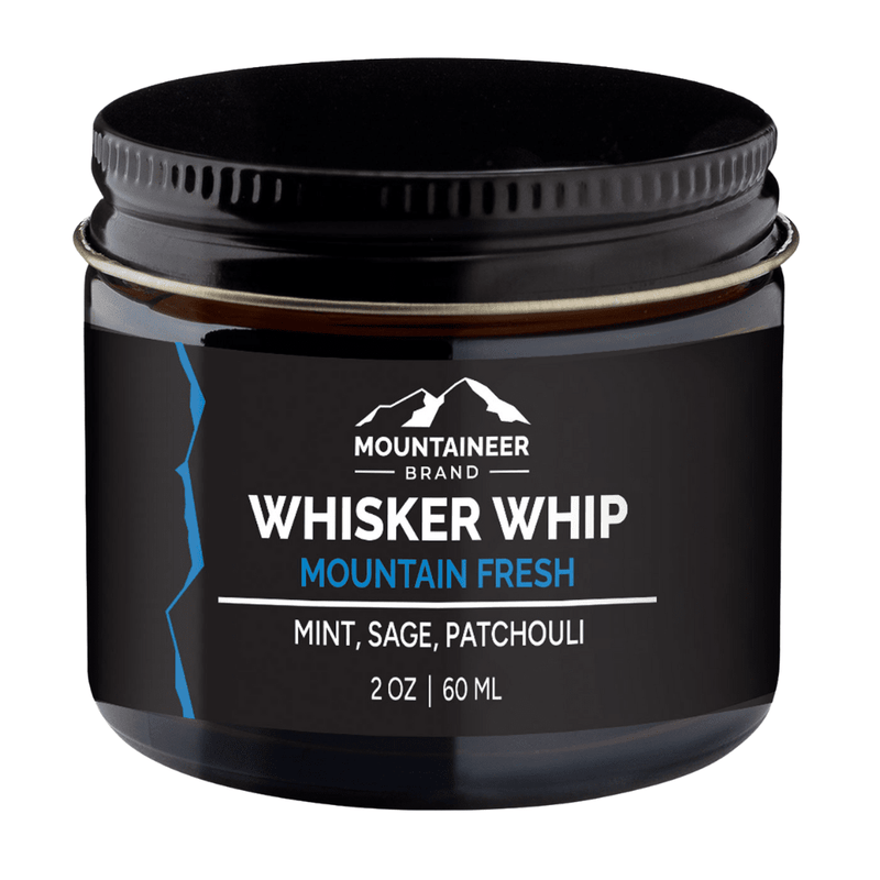 A jar of Mountaineer Brand Whisker Whip Beard Butter. This Whipped Beard butter is available in Mountain Fresh in mountain fresh scent, containing mint, sage, and patchouli with natural ingredients, 2 oz / 60 ml.