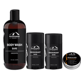A collection of unscented personal care products by Mountaineer Brand Products, perfect for your post-workout routine, including the Gym Bag Kit containing body wash, deodorant, and muscle rub.