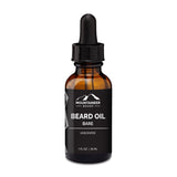A bottle of Mountaineer Brand Products Natural Beard Oil with a dropper, containing 1 fl oz (30 ml) of natural oils, isolated on a white background.