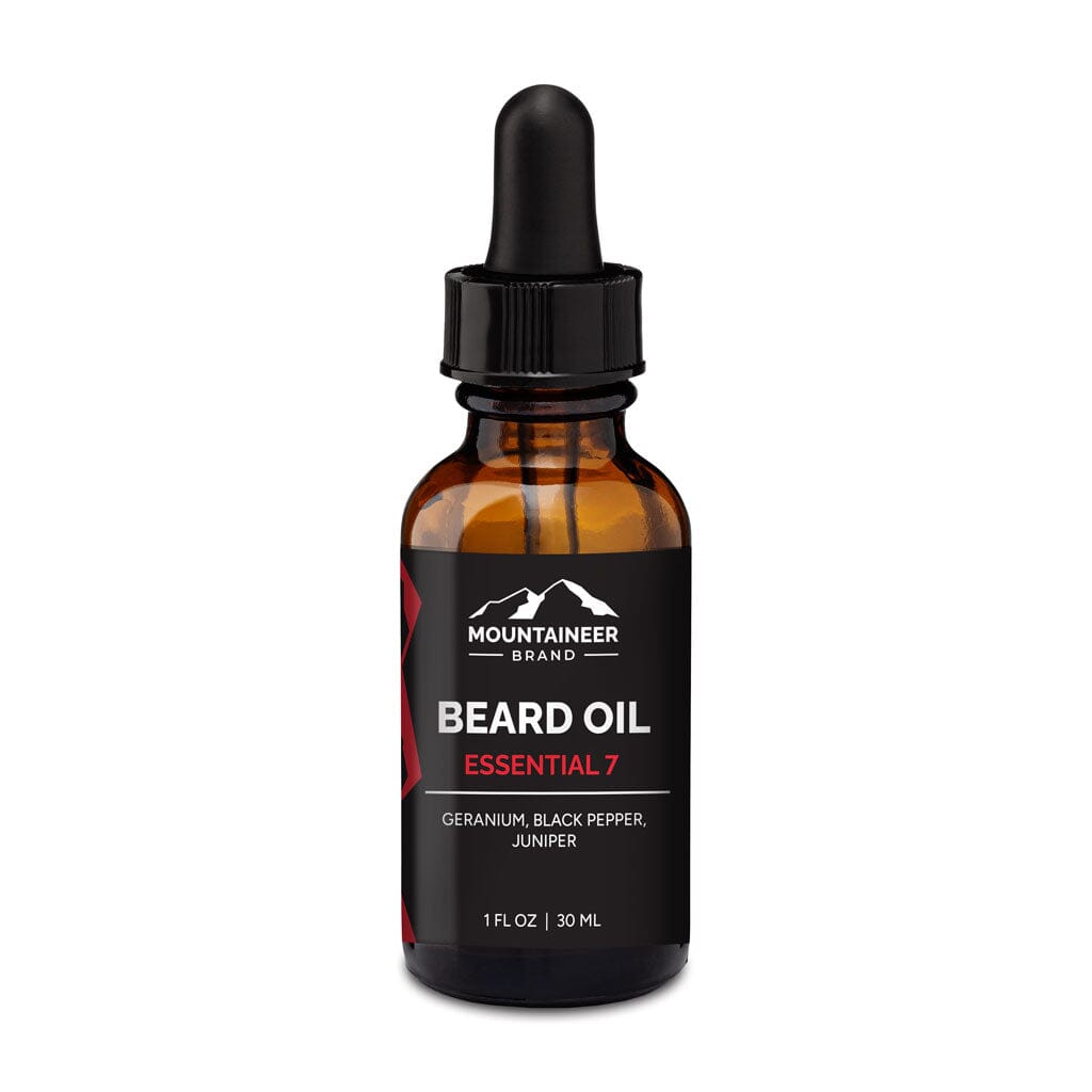 A bottle of Mountaineer Brand Products' Essential 7 Beard Oil on a white background.