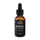 An all-natural, organic bottle of Mountaineer Brand Products' White Water Beard Oil on a white background.