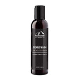 A bottle of Mountaineer Brand Products Beard Wash labeled "smokey bourbon" with bourbon, cypress, and tobacco scents, featuring natural ingredients, 8 fl oz (240 ml).
