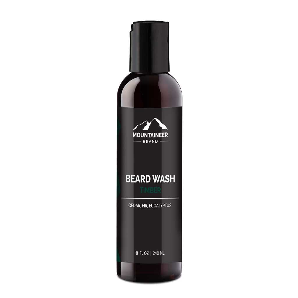 A bottle of Mountaineer Brand Products natural beard wash labeled "timber" with scents of cedar, fir, and eucalyptus, featuring natural ingredients, 8 fl oz (240 ml).