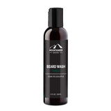 A bottle of Mountaineer Brand Products natural beard wash labeled "timber" with scents of cedar, fir, and eucalyptus, featuring natural ingredients, 8 fl oz (240 ml).