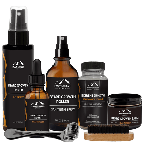 A variety of the Complete Beard Growth System from Mountaineer Brand Products, including Beard Growth Serum, spray, supplements, and balm, displayed with a brush and comb.