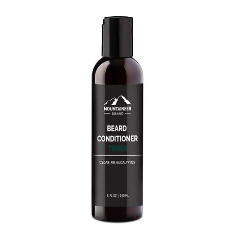 A bottle of Mountaineer Brand Products Natural Beard Conditioner labeled "timber" with cedar, fir, and eucalyptus scents, 8 fl oz, on a white background.