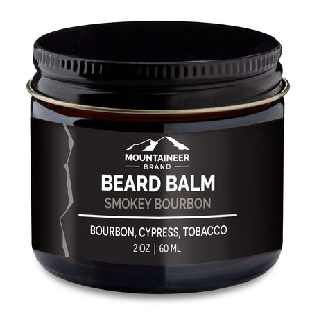 A black jar of Mountaineer Brand Products Natural Beard Balm labeled "smokey bourbon" with bourbon, cypress, and tobacco scents from natural essential oils, 2 oz (60 ml).