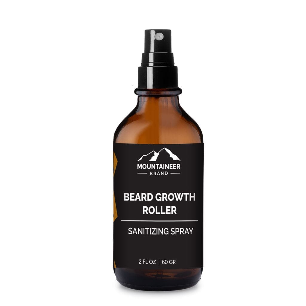 Amber glass bottle of Mountaineer Brand Products Beard Growth Box + Free Starter Kit sanitizer spray against a white background.