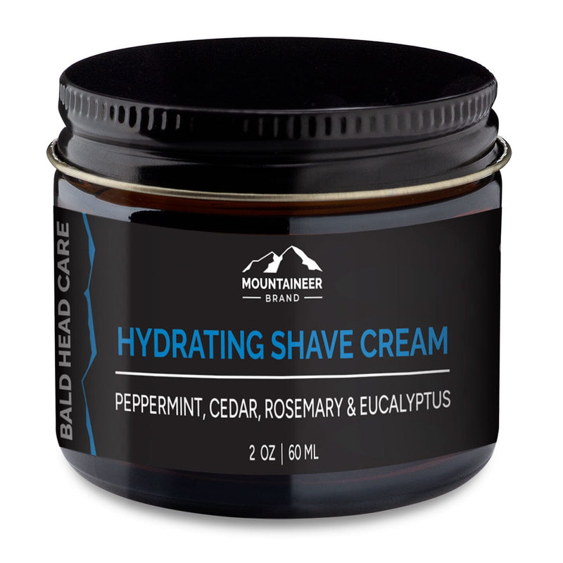 Jar of Mountaineer Brand Products Hydrating Shave Cream designed to prevent razor bumps, with peppermint, cedar, rosemary, and eucalyptus, 2 oz (60 ml).