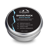 Organic Mountaineer Brand Products shave puck in a tin, offering chemical-free men's care.