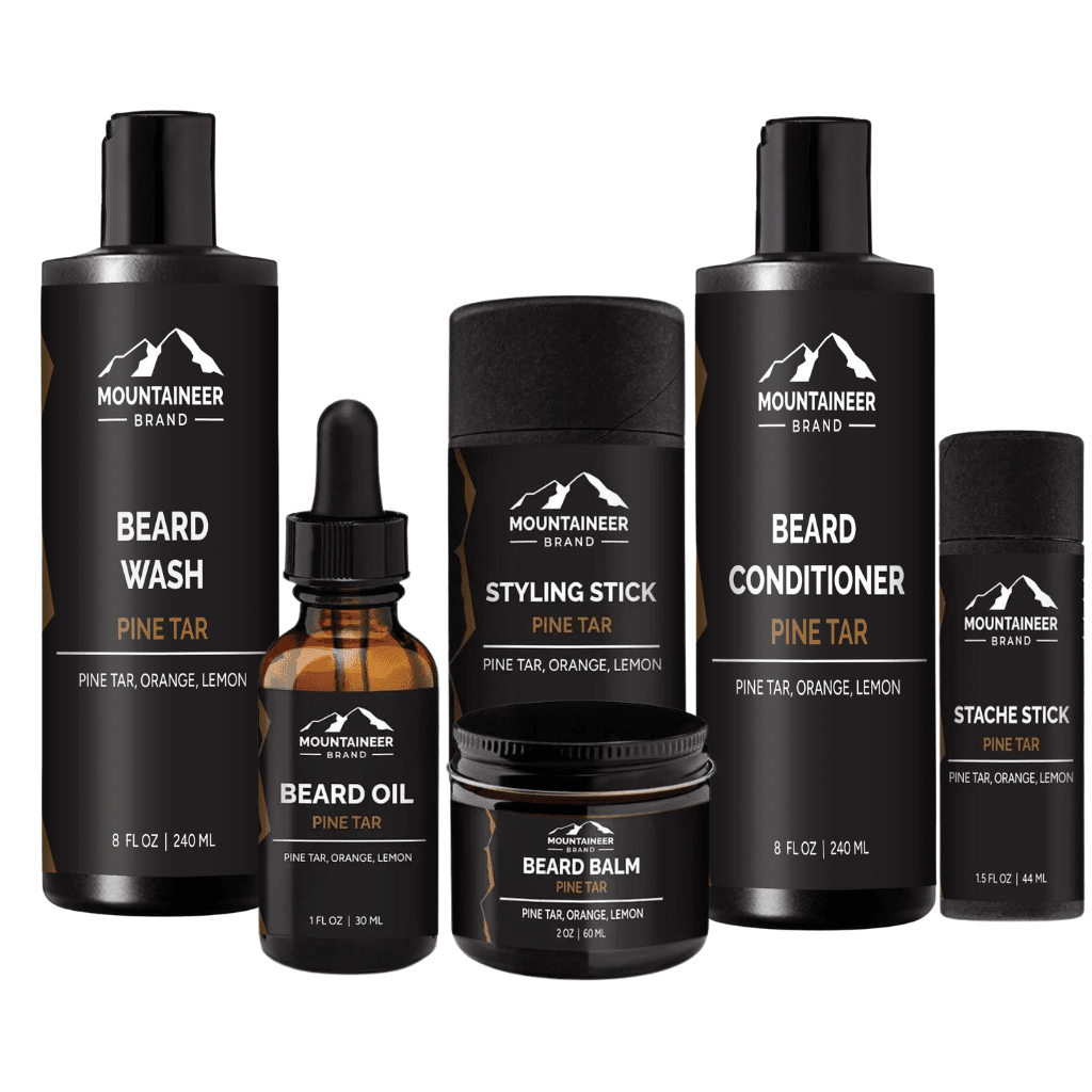 An all-inclusive Mountaineer Brand Products Big Beard Kit that offers a complete grooming experience, including a bottle of beard oil, beard shampoo, and beard conditioner.