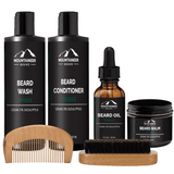 The Starter Beard Kit from Mountaineer Brand Products provides a comprehensive grooming experience with beard oil, conditioner, and brush.