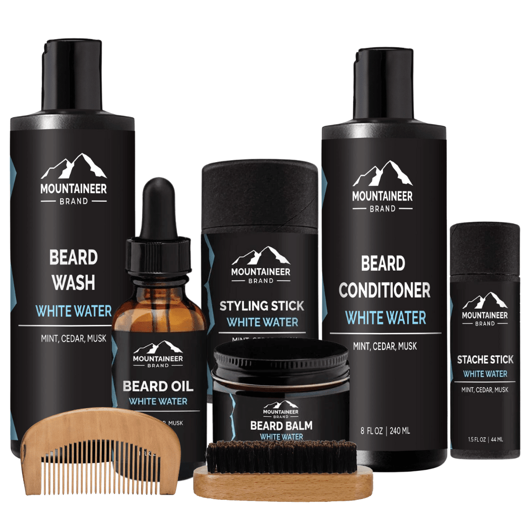 A grooming kit for beard care including The Ultimate Beard Kit by Mountaineer Brand Products, which consists of a beard brush and beard oil.