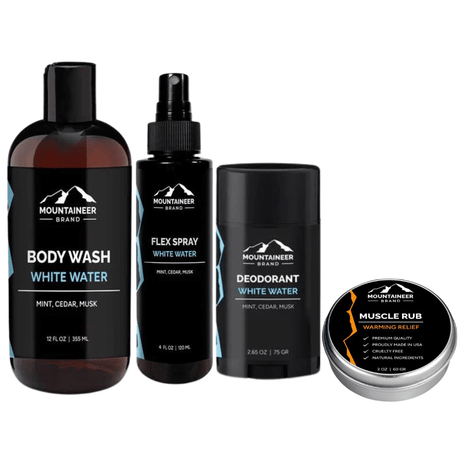 A collection of men's grooming products from Mountaineer Brand Products, ideal for fitness enthusiasts, including body wash, flex spray, deodorant, and muscle rub in a convenient Mountaineer Brand Gym Bag Kit for post.