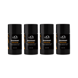 Three Mountaineer Brand Products all-natural black and orange Natural Deodorant 4-Pack sticks on a white background.