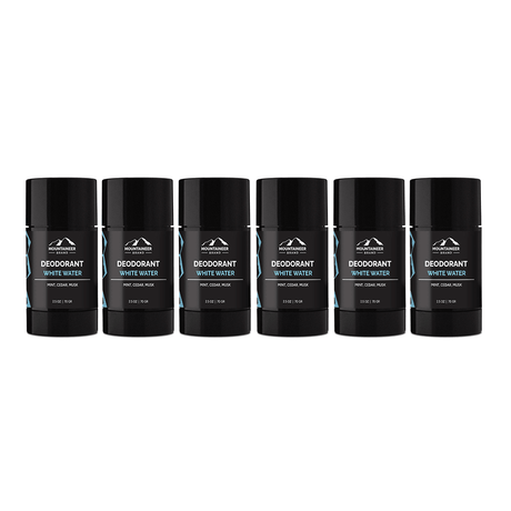 Six Mountaineer Brand Products all-natural black deodorant sticks on a white background.
