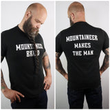 A man with an all-natural beard wearing a Mountaineer Brand 10 Year T-shirt that says Mountaineer Brand Products makes the man.