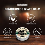 Product advertisement image for Mountaineer Brand Products Natural Beard Balm, highlighting that it is 100% natural with essential oils and aids in conditioning, maintaining, and repairing the beard.