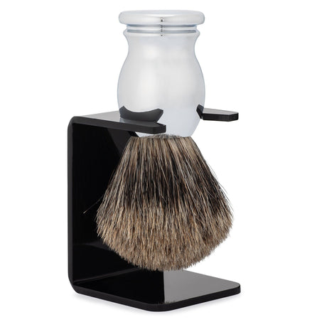 An organic Parker Shave Brush on a black stand designed for men's care, free from any harmful chemicals by Mountaineer Brand Products.