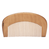 An all natural Mountaineer Brand Products Wooden Beard Comb on a white background.