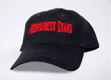 A Mountaineer Brand Logo Style Adjustable Ball Cap, made with all-natural fibers and featuring the word 'Mountaineer Brand Products' on it.